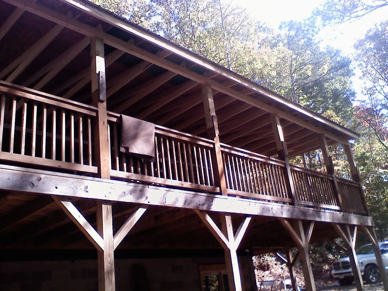 Timber framing under a new elevated porch and deck — Roof Leak Repair in Texhoma by Roofing Brothers